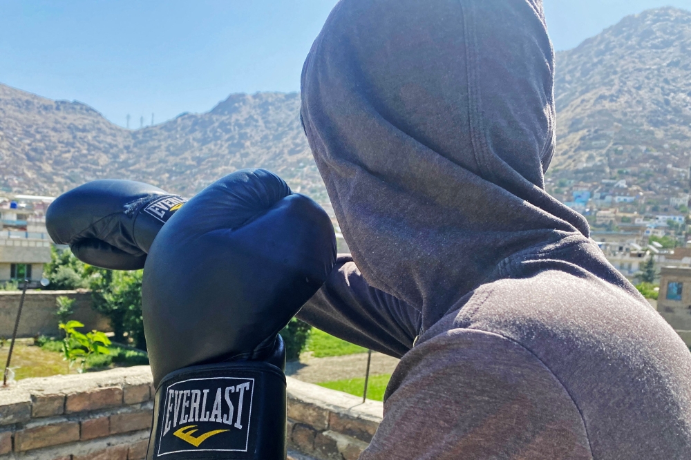 Afghan women train in secret, not for competition, but for health and peace of mind in a country where the Taliban government has banned women from playing sports. - AFP image 